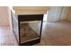 Gas fireplace with glass front and tile surround at 6684 Coronado Crest Ave, Las Vegas, NV 89139