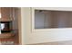 Gas fireplace with glass front and tile surround at 6684 Coronado Crest Ave, Las Vegas, NV 89139