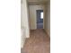 Upstairs hallway with carpet and doors to bedrooms at 6684 Coronado Crest Ave, Las Vegas, NV 89139