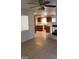 Kitchen with wood cabinets and view to living room at 6684 Coronado Crest Ave, Las Vegas, NV 89139