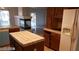 Kitchen with island, ample counter space, and view of Gathering room at 6684 Coronado Crest Ave, Las Vegas, NV 89139
