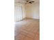 Living room with tile floors and sliding glass doors at 6684 Coronado Crest Ave, Las Vegas, NV 89139
