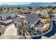 Aerial view of house with a two-car garage and a small backyard at 7711 Gracemoor Ct, Las Vegas, NV 89149