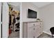 Bedroom with a dresser, closet, and TV at 1204 Airborne Ct, North Las Vegas, NV 89032