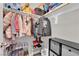 Well-organized ' closet with clothing, shoes and shelving at 1204 Airborne Ct, North Las Vegas, NV 89032