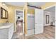 Bathroom with an open doorway to the bedroom and a glass shower adds to the home's functionality at 12745 Fairfield Ave, Henderson, NV 89044