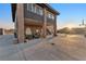 Exterior angle of the home showing the parking area, and a fountain at 12745 Fairfield Ave, Henderson, NV 89044
