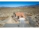 Aerial view of house and surrounding desert landscape at 1900 E Highland Ave, Pahrump, NV 89048