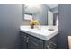 Bathroom with vanity and gray cabinets at 207 Charter Oak St, Henderson, NV 89074