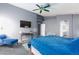 Primary bedroom with a large bed, TV, and ensuite bathroom access at 207 Charter Oak St, Henderson, NV 89074