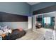Bedroom with mirrored closet doors and a bed at 207 Charter Oak St, Henderson, NV 89074
