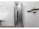 Clean hallway with gray walls and tiled floor at 207 Charter Oak St, Henderson, NV 89074