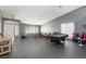 Bright living room with pool table, and ample natural light at 207 Charter Oak St, Henderson, NV 89074