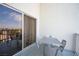 Balcony with patio furniture and sliding door access at 211 E Flamingo Rd # 414, Las Vegas, NV 89169