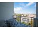 Private balcony with table and chairs offering city views at 211 E Flamingo Rd # 414, Las Vegas, NV 89169