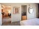 Spacious bedroom with a view into the living area and a dresser at 211 E Flamingo Rd # 414, Las Vegas, NV 89169
