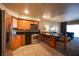 Modern condo kitchen, wood cabinets, granite counters at 211 E Flamingo Rd # 414, Las Vegas, NV 89169