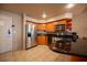Modern condo kitchen, wood cabinets, granite counters at 211 E Flamingo Rd # 414, Las Vegas, NV 89169