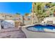 Inviting backyard oasis with a sparkling pool and spa at 2572 Hidden Forest Cir, Henderson, NV 89074