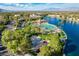 Aerial view of community pool, basketball court, and lakefront at 3125 N Buffalo Dr # 2136, Las Vegas, NV 89128