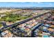 Aerial view of community near a park and city skyline at 3125 N Buffalo Dr # 2136, Las Vegas, NV 89128