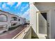 Spacious balcony overlooking the complex courtyard and landscaping at 3125 N Buffalo Dr # 2136, Las Vegas, NV 89128