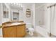Clean bathroom with a shower/tub combo and wood vanity at 3125 N Buffalo Dr # 2136, Las Vegas, NV 89128