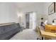 Bright bedroom with a comfortable sofa bed and workspace at 3125 N Buffalo Dr # 2136, Las Vegas, NV 89128
