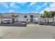 Building entrance with parking and landscaping at 3125 N Buffalo Dr # 2136, Las Vegas, NV 89128