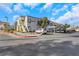 Exterior view of the building and parking lot at 3125 N Buffalo Dr # 2136, Las Vegas, NV 89128