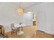 Bright dining area with a white table and chairs at 3125 N Buffalo Dr # 2136, Las Vegas, NV 89128
