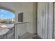 Secured entry with a metal door leading to the unit at 3125 N Buffalo Dr # 2136, Las Vegas, NV 89128