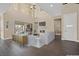 Virtually staged living room with modern furniture, fireplace and high ceilings at 315 Calgrove St, Las Vegas, NV 89138