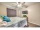 Comfortable bedroom with full bed, ceiling fan and TV at 4025 Ridgewood Ave, Las Vegas, NV 89120