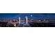 Nighttime aerial view of Las Vegas skyline, showcasing city lights and surrounding landscape at 4381 W Flamingo Rd # 2105, Las Vegas, NV 89103