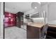 Sleek kitchen with stainless steel appliances and breakfast bar at 4381 W Flamingo Rd # 2105, Las Vegas, NV 89103