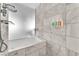 Spa-like bathroom featuring a soaking tub and stylish tile at 4381 W Flamingo Rd # 3819, Las Vegas, NV 89103