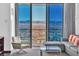 Relaxing living room with a sectional sofa and breathtaking views at 4381 W Flamingo Rd # 3819, Las Vegas, NV 89103
