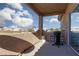 Private balcony with a view of the neighborhood, complete with a grill and folding tables at 6701 Dorita Ave # 201, Las Vegas, NV 89108