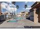 Resort-style pool area with pristine pools and spa, complemented by comfortable lounge chairs at 6701 Dorita Ave # 201, Las Vegas, NV 89108