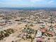 Aerial view of a house with city views and desert landscape at 672 Los Feliz St, Las Vegas, NV 89110