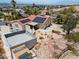 Aerial view of house with solar panels, pool, and desert landscaping at 672 Los Feliz St, Las Vegas, NV 89110