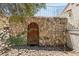 Exterior basement entrance with stonework at 672 Los Feliz St, Las Vegas, NV 89110