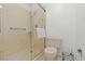 Updated bathroom with a walk-in shower and grab bars at 672 Los Feliz St, Las Vegas, NV 89110