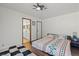 Comfortable bedroom with a king-size bed and an en-suite bathroom at 672 Los Feliz St, Las Vegas, NV 89110