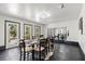 Elegant dining room with a large table and access to backyard at 672 Los Feliz St, Las Vegas, NV 89110
