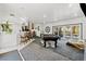 Game room with pool table, bar, and access to patio at 672 Los Feliz St, Las Vegas, NV 89110