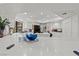 Bright kitchen boasts white cabinets, an island, and modern appliances at 672 Los Feliz St, Las Vegas, NV 89110