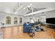Spacious living room with vaulted ceilings, hardwood floors, and a cozy seating area at 672 Los Feliz St, Las Vegas, NV 89110