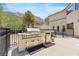 Built-in stainless steel outdoor kitchen and grill at 672 Los Feliz St, Las Vegas, NV 89110